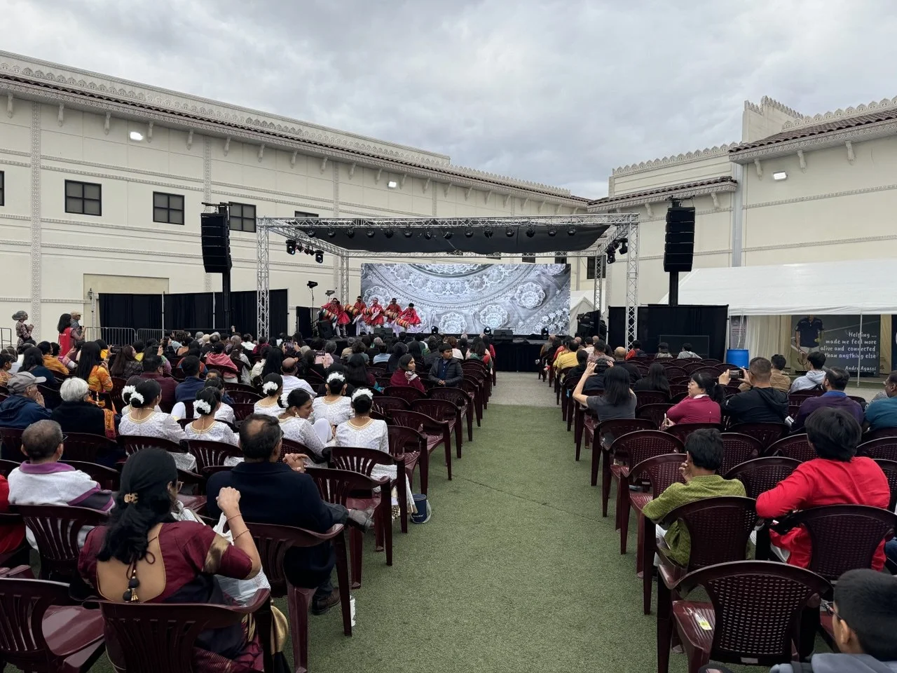 Outdoor festival sound system with speakers on stands at BAPS Chino Hills